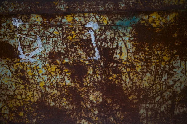 Metal sheet covered with rust and paint — Stock Photo, Image