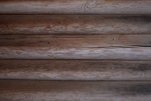 Ahşap duvar Silindire tomruklardan, soluk ve yıpranmış yakın çekim