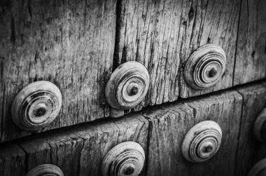 old doors close up view - knobs, design elements, architecture of the ancient doors within the streets of the spanish cities