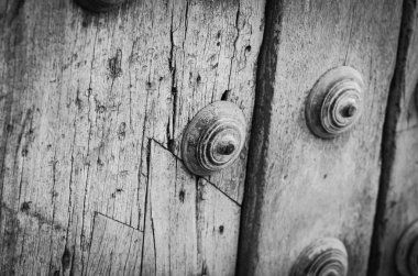 old doors close up view - knobs, design elements, architecture of the ancient doors within the streets of the spanish cities