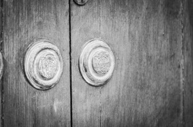 old doors close up view - knobs, design elements, architecture of the ancient doors within the streets of the spanish cities