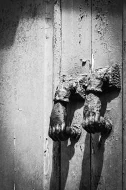 old doors close up view - knobs, design elements, architecture of the ancient doors within the streets of the spanish cities
