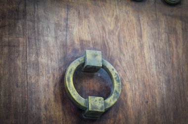 old doors close up view - knobs, design elements, architecture of the ancient doors within the streets of the spanish cities