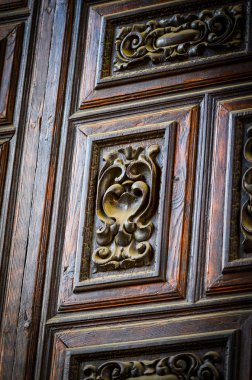old doors close up view - knobs, design elements, architecture of the ancient doors within the streets of the spanish cities