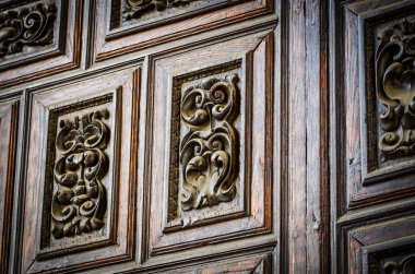 old doors close up view - knobs, design elements, architecture of the ancient doors within the streets of the spanish cities