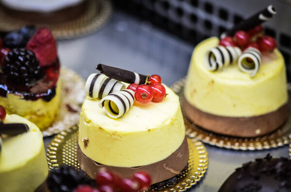 tasty mini cakes with fresh ingredients & fruits