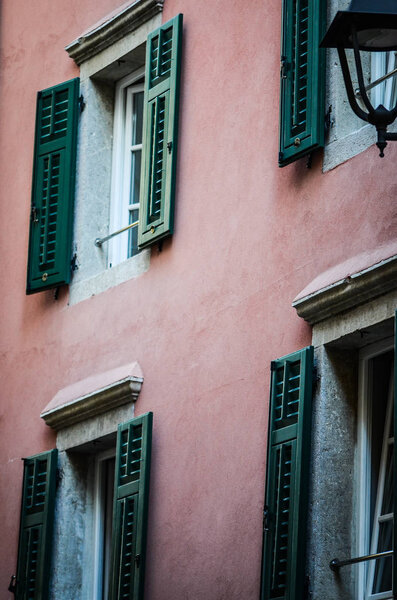 Close up view of the historical buildings of Trieste - old windows, old facade, old architecture