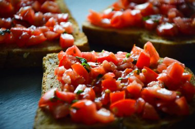 deliciouse tomatoes bruschetta with fresh basil