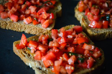 deliciouse tomatoes bruschetta with fresh basil