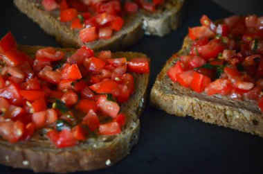 deliciouse tomatoes bruschetta with fresh basil