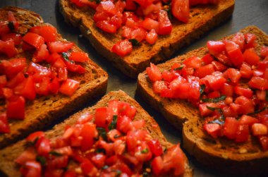 deliciouse tomatoes bruschetta with fresh basil