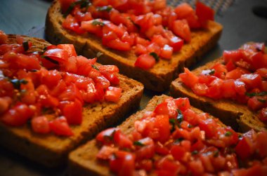 deliciouse tomatoes bruschetta with fresh basil