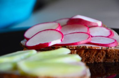 delicious cheese bruschetta with radish & cucumber