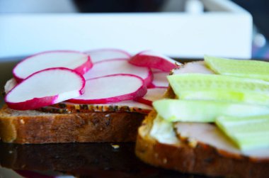 delicious cheese bruschetta with radish & cucumber