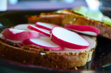delicious cheese bruschetta with radish & cucumber