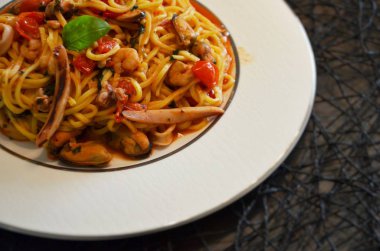 delicious seafood pasta with fresh vegetables & spices