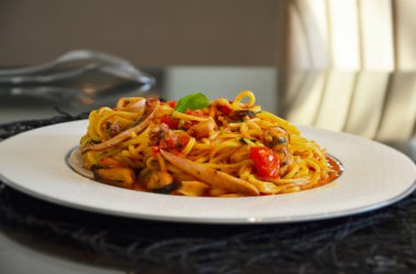 delicious seafood pasta with fresh vegetables & spices