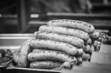 Czech specialities - grilled sausages within the Christmas market in Prague