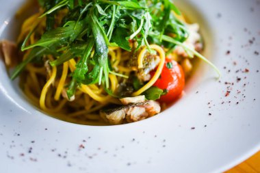 delicious fresh italian pasta with fish & rucola salad