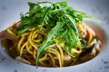 delicious fresh italian pasta with fish & rucola salad