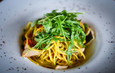delicious fresh italian pasta with fish & rucola salad