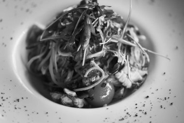 delicious fresh italian pasta with fish & rucola salad