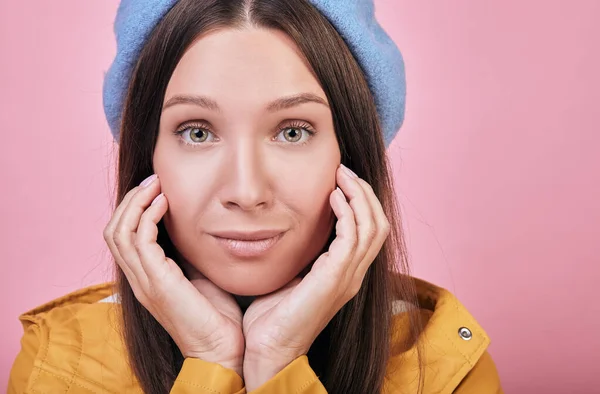 Cool cute girl in blue beret and a yellow rain jacket — Stock Photo, Image