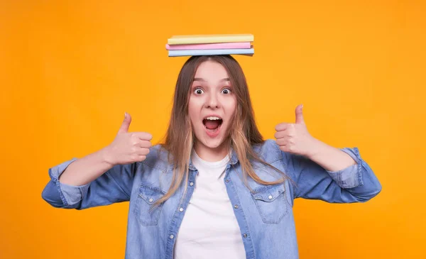 Young Cute Blond Caucasian Girl Books Her Head Looks Happy — Stock Photo, Image