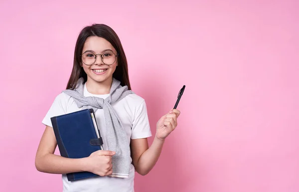Young Cute Caucasian Brunette Schoolgirl Glasses Smiling Holds Book Her — Stock Photo, Image