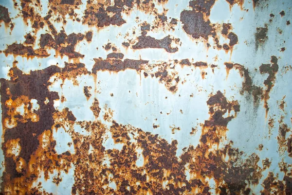 Texture of old rusty iron with peeling paint — Stockfoto