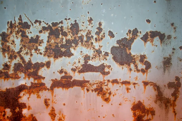 Texture of old rusty iron with peeling paint — Stockfoto