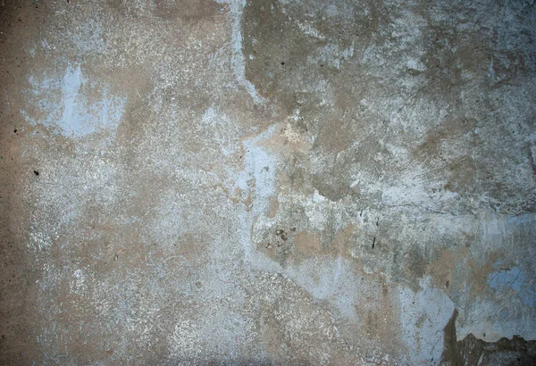 texture of old stone wall covered with white plaster