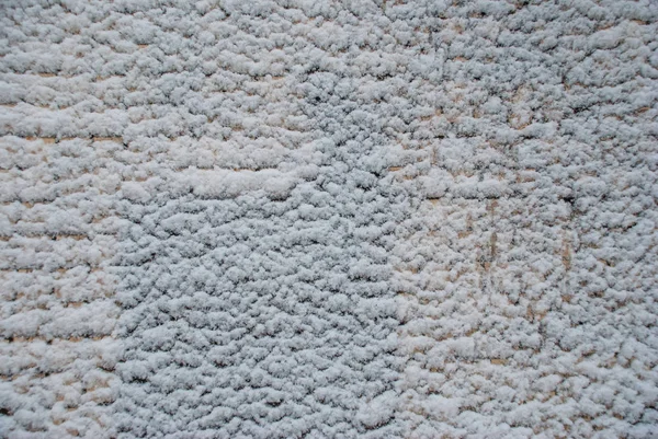 背景、テクスチャ - 大まかな石積みの壁は一部雪で覆われて — ストック写真