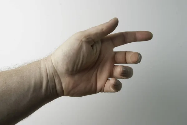 Die rechte und linke Hand einer Person, die versucht, etwas zu erreichen oder zu greifen. Werfen, Zeichen berühren. Ich greife nach links. isoliert auf weißem Hintergrund — Stockfoto