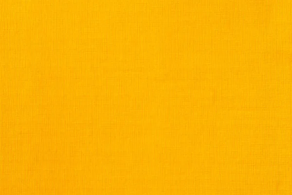 Pürüzlü kumaşın sarı arka planının dokusu