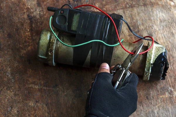 Steel pipe explosive with hand hold wire cutter tool for cutting — Stock Photo, Image