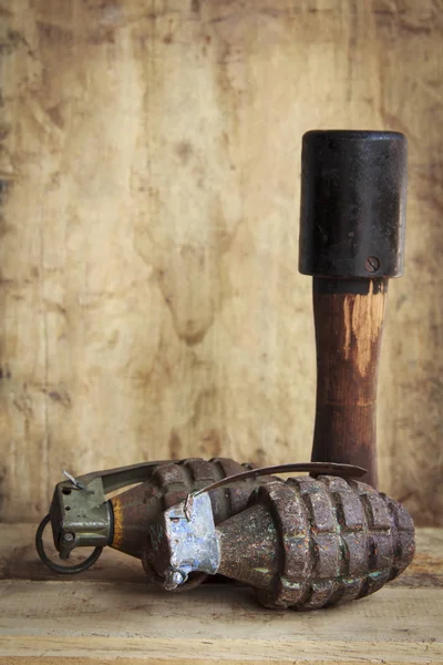 Grenade on old wood for background and texture — Stock Photo, Image