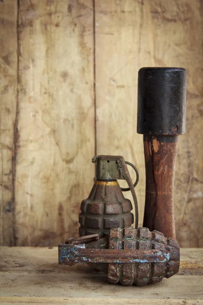 Grenade on old wood for background and texture — Stock Photo, Image