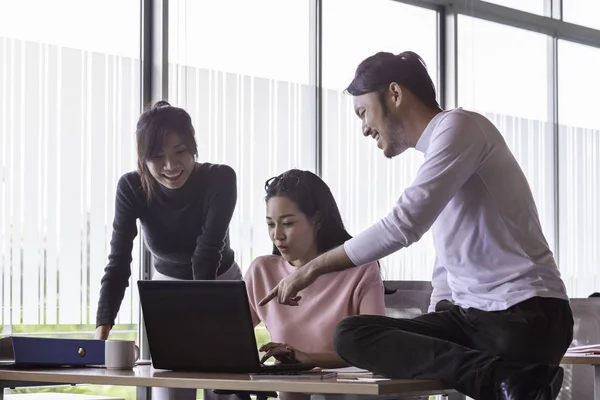 New generation of people work together in a office.