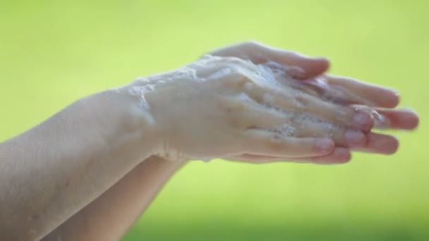 Woman Washes Hands Soap Outdoors Hands Girl Close While Washing — Stock Video