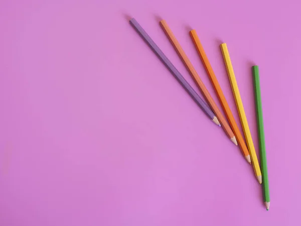 Colour pencils isolated on pink background — Stock Photo, Image