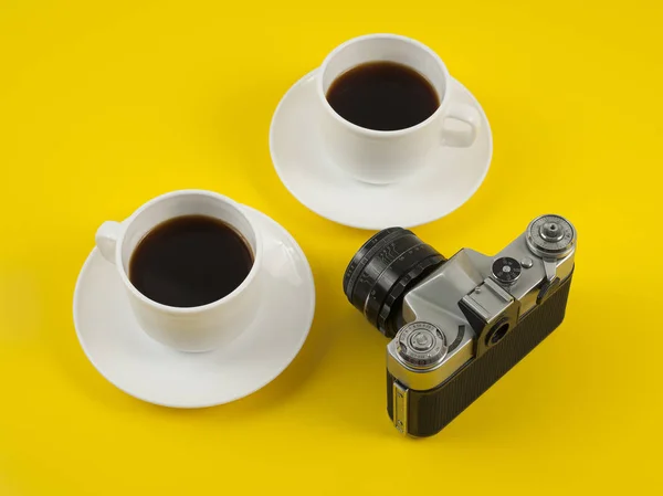 Cup coffee isolated on yellow — Stock Photo, Image