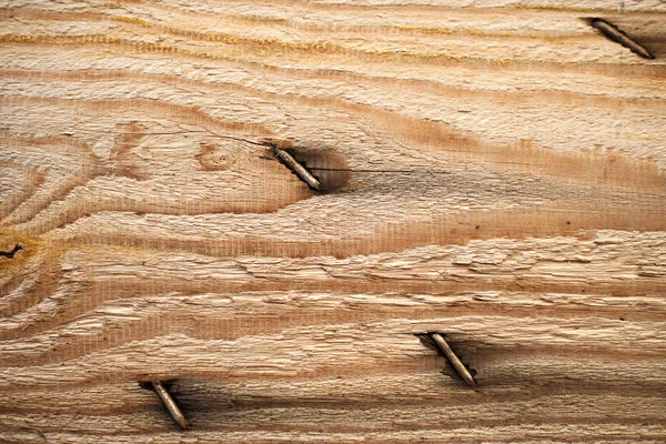 Rostiger Nagel in altem Holz von oben — Stockfoto