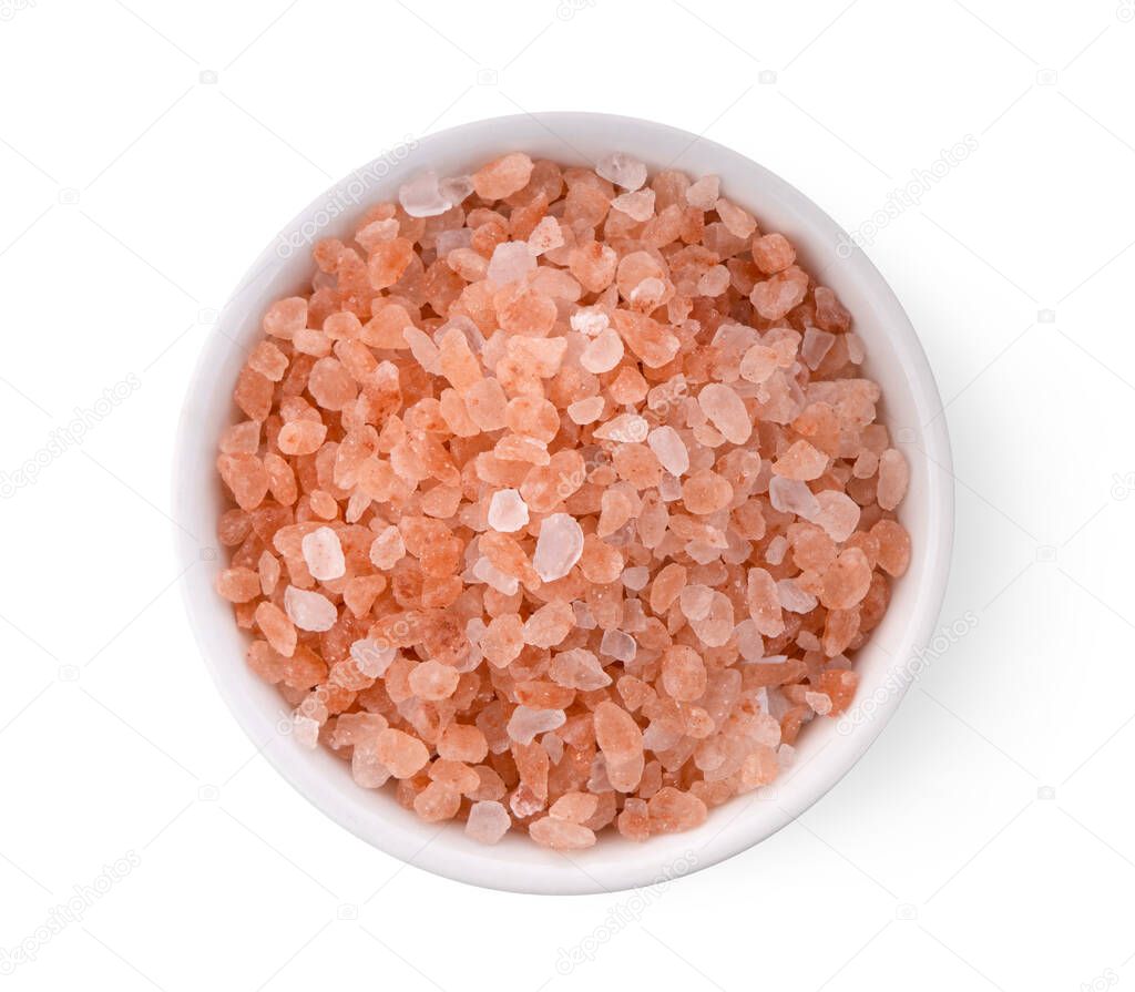 Himalayan salt raw crystals in a bowl Isolated on white background. top view