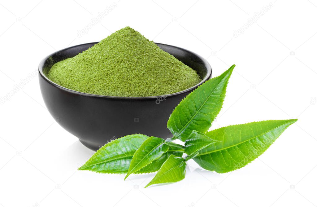 instant matcha green tea in black bowl and leaf on white background