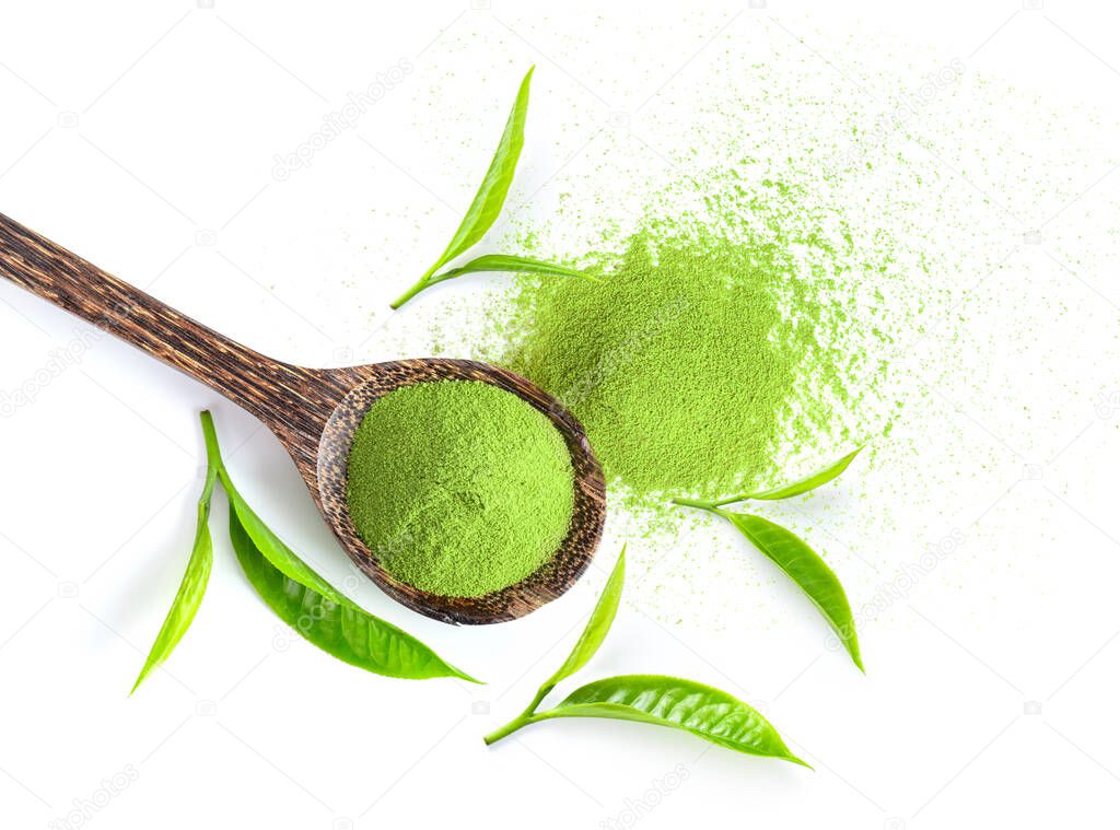 tea leaf and matcha green tea powder in wood spoon isolated on white background. top view