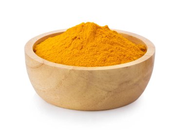 turmeric powder in wood bowl Isolated on white background clipart