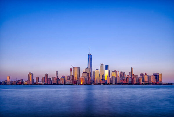 After sun goes down, magic hour view of Manhattan island from New Jersey