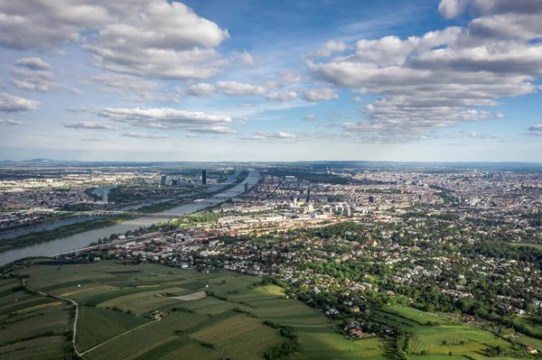 Aerial drone shot of vienna city with dramatic clouds in sunny day — Stock Photo, Image