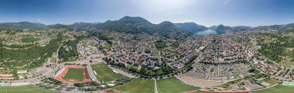 Aerial drone shot panorama view of Lugano by lake, monte salvatore, monte bre in Switzerland — Stock Photo, Image